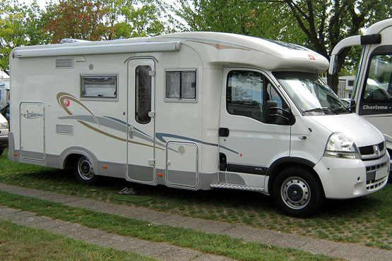Recreational vehicle parked outdoors, representing travel safety and recreational insurance coverage.