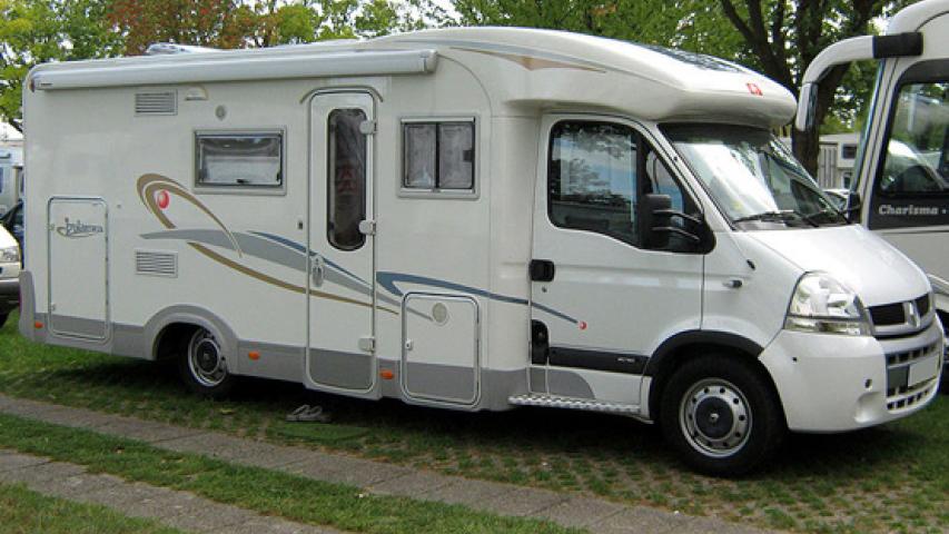 Recreational vehicle parked outdoors, representing travel safety and recreational insurance coverage.